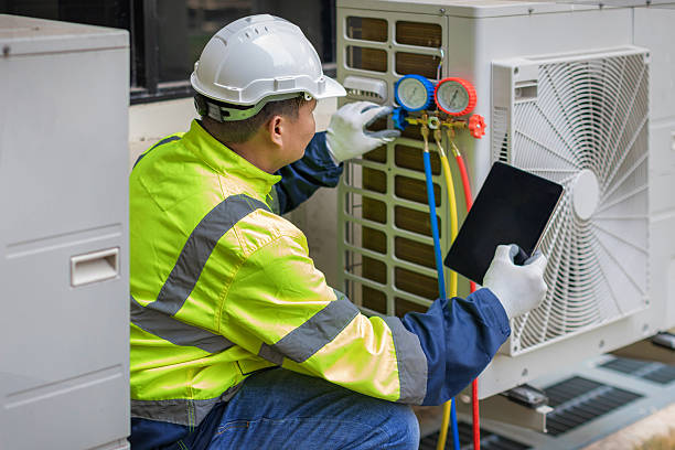 Professional Air Duct Cleaning technician working in Howells, NY